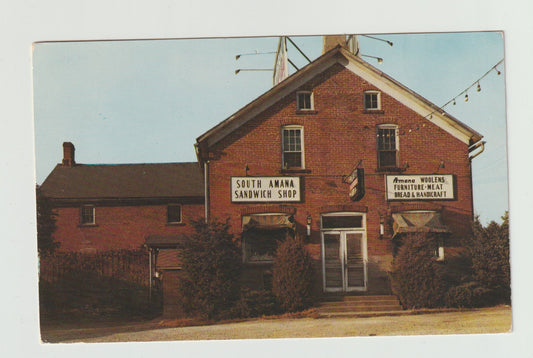 Postcard IA Iowa Amana Sandwich Shop Woolens Meat Bread Handcraft Building Chrome Unused